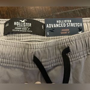 Hollister 9 inch men’s size small gray shorts. New with tags. Advanced stretch.